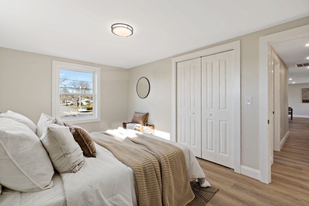 602 Regan Road Somerset, MA 02726 - Photo 18 of 35 a bedroom with a bed and a window