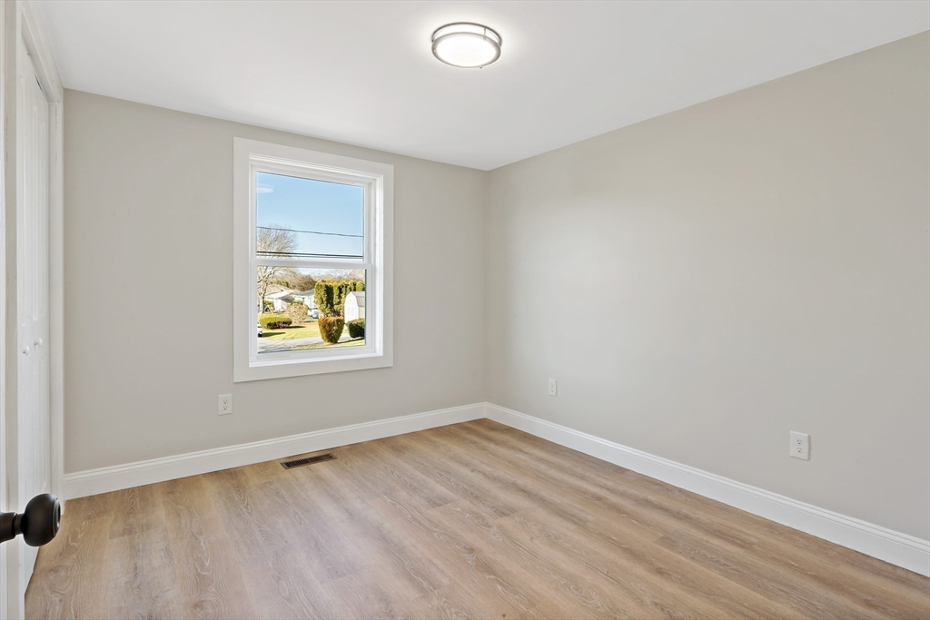 602 Regan Road Somerset, MA 02726 - Photo 21 of 35 an empty room with a window