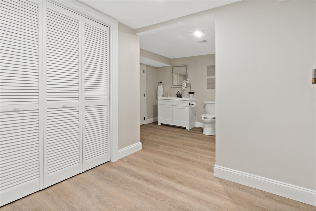 602 Regan Road Somerset, MA 02726 - Photo 30 of 35 a view of a kitchen with wooden floor