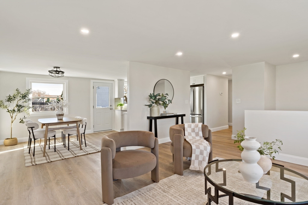 602 Regan Road Somerset, MA 02726 - Photo 4 of 35 a view of a dining room with furniture and wooden floor