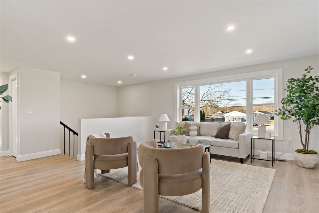 602 Regan Road Somerset, MA 02726 - Photo 6 of 35 a living room with furniture and a large window