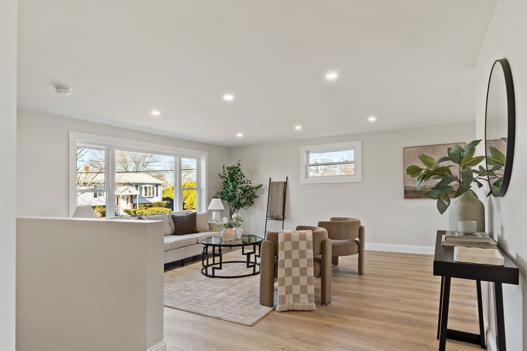 602 Regan Road Somerset, MA 02726 - Photo 7 of 35 a living room with furniture a window and a table
