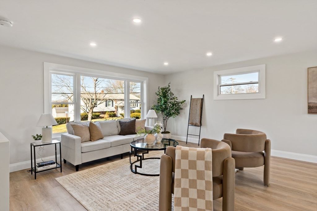 602 Regan Road Somerset, MA 02726 - Photo 8 of 35 a living room with furniture and a large window
