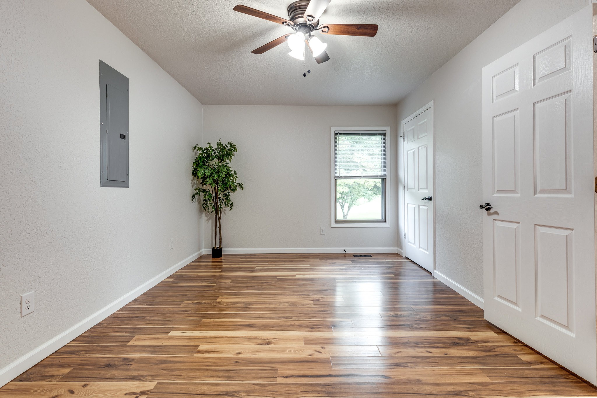 340 Old Spring Creek Road Estill Springs, TN 37330 - Photo 25 of 60 a view of a livingroom with a window and wooden floor