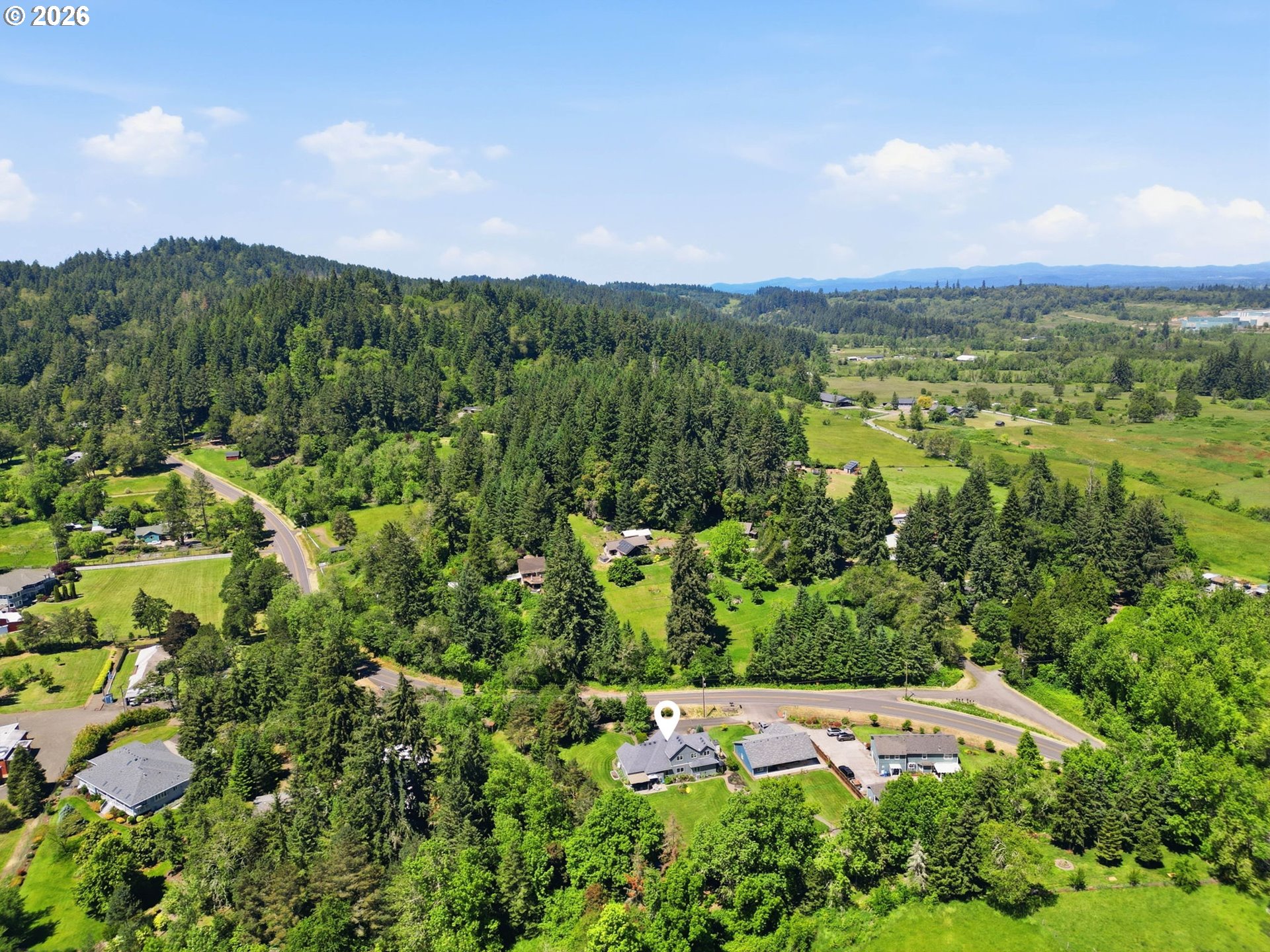 29778 Gimpl Hill Road Eugene, OR 97405 - Photo 41 of 43 a view of a city with lush green forest