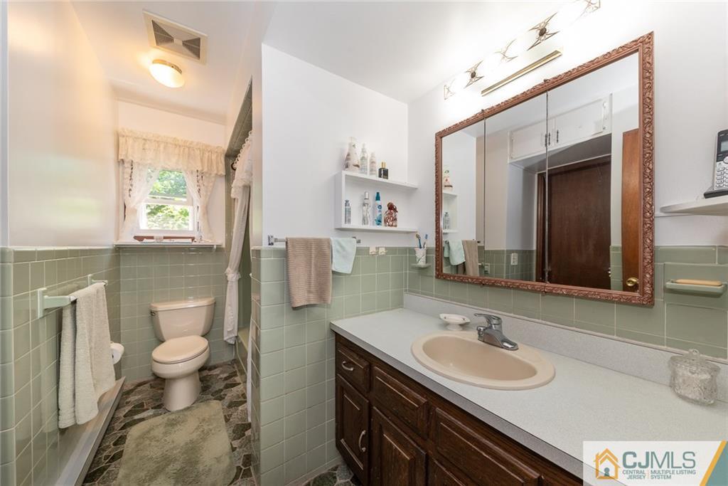 195 North New Prospect Road Jackson, NJ 08527 - Photo 12 of 25 a bathroom with a sink double vanity and a toilet