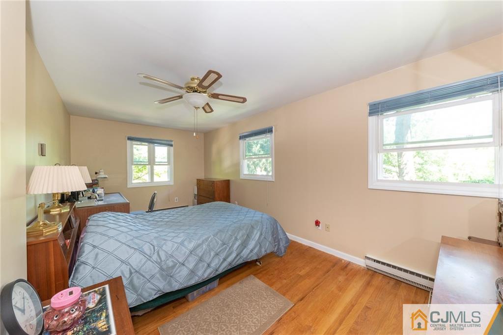 195 North New Prospect Road Jackson, NJ 08527 - Photo 13 of 25 a bedroom with a bed and window