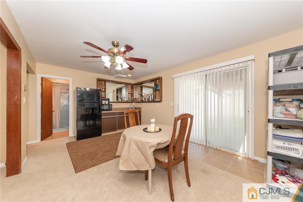 195 North New Prospect Road Jackson, NJ 08527 - Photo 16 of 25 a view of a dining room with furniture and a window