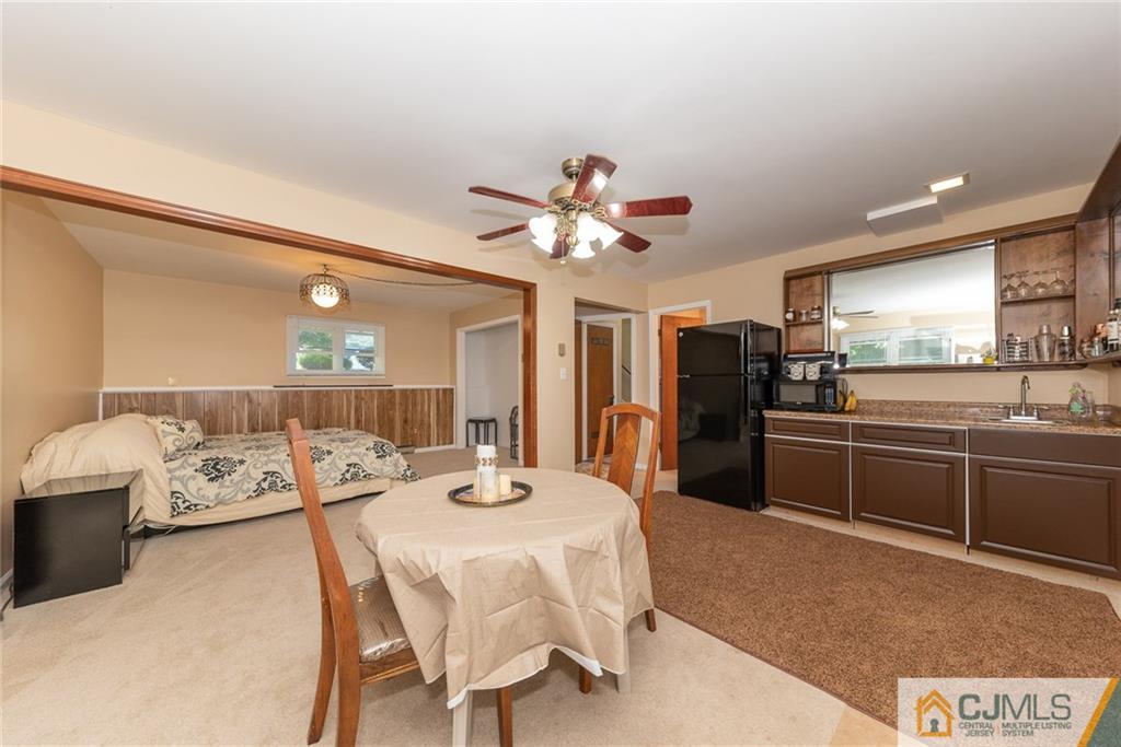 195 North New Prospect Road Jackson, NJ 08527 - Photo 17 of 25 a kitchen with stainless steel appliances kitchen island granite countertop a sink and cabinets