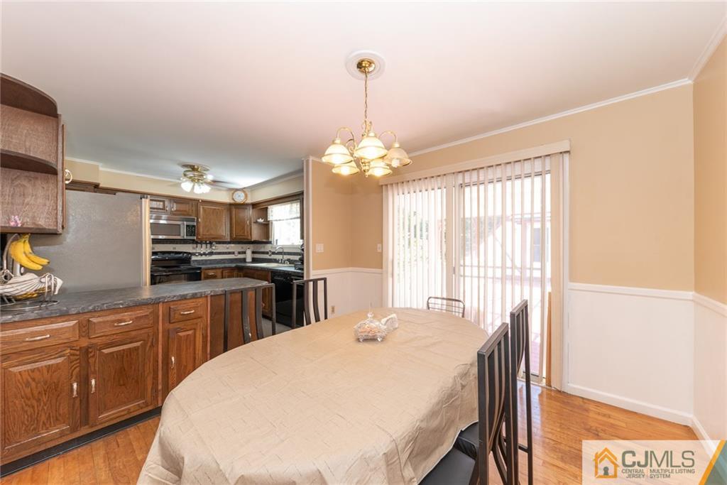 195 North New Prospect Road Jackson, NJ 08527 - Photo 7 of 25 a kitchen with kitchen island granite countertop a sink and appliances