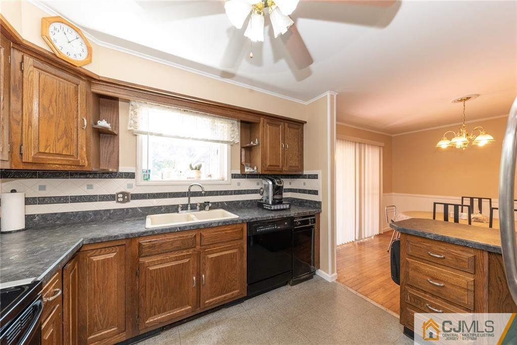 195 North New Prospect Road Jackson, NJ 08527 - Photo 9 of 25 a kitchen with kitchen island granite countertop a sink cabinets stainless steel appliances and a counter top space
