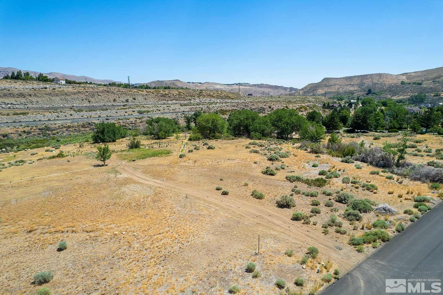 3205 Mario Road Verdi, NV 89523 - Photo 11 of 18 a view of a beach with a mountain view in back
