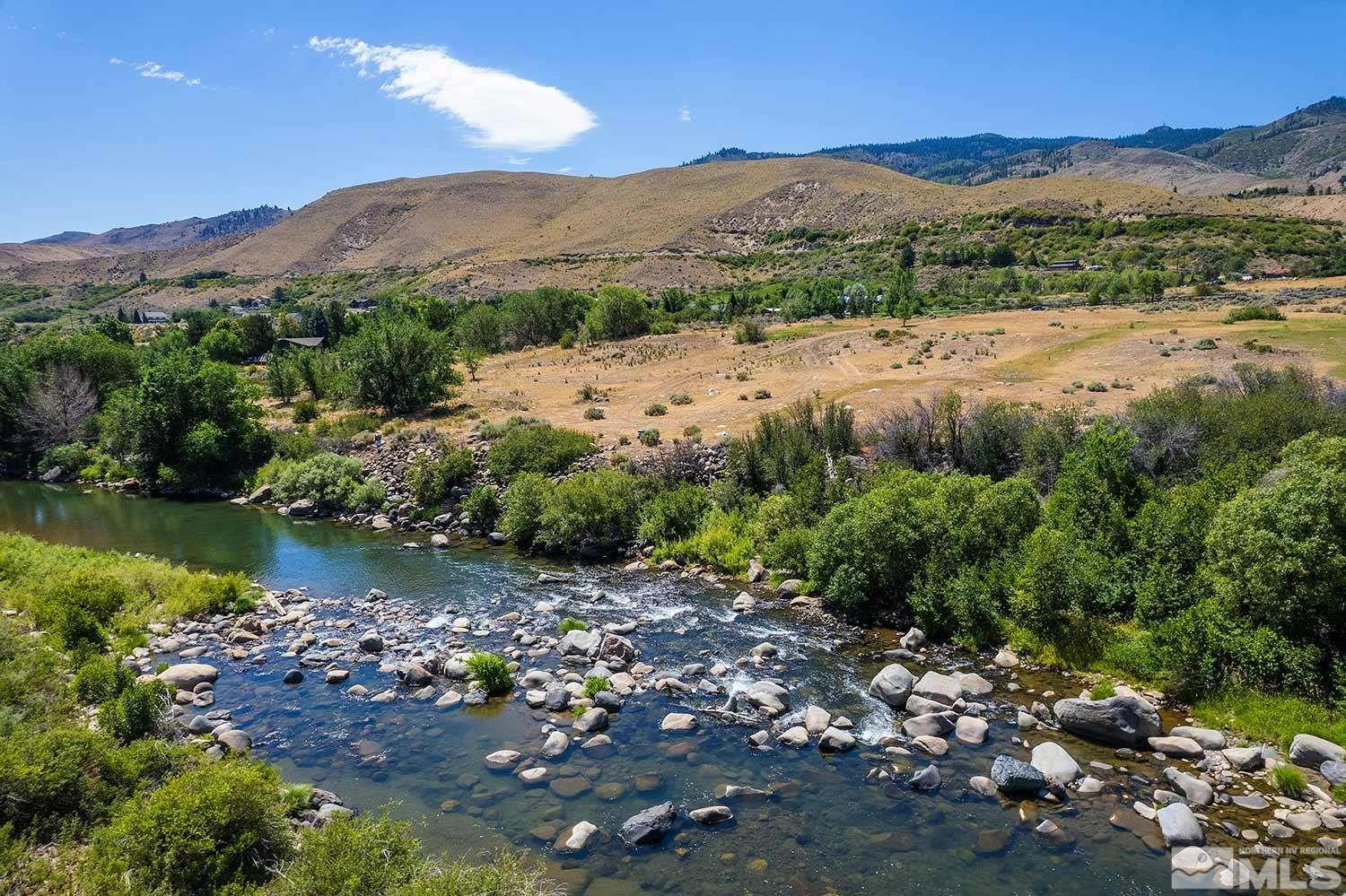 3205 Mario Road Verdi, NV 89523 - Photo 5 of 18 a view of a lush green hillside and houses