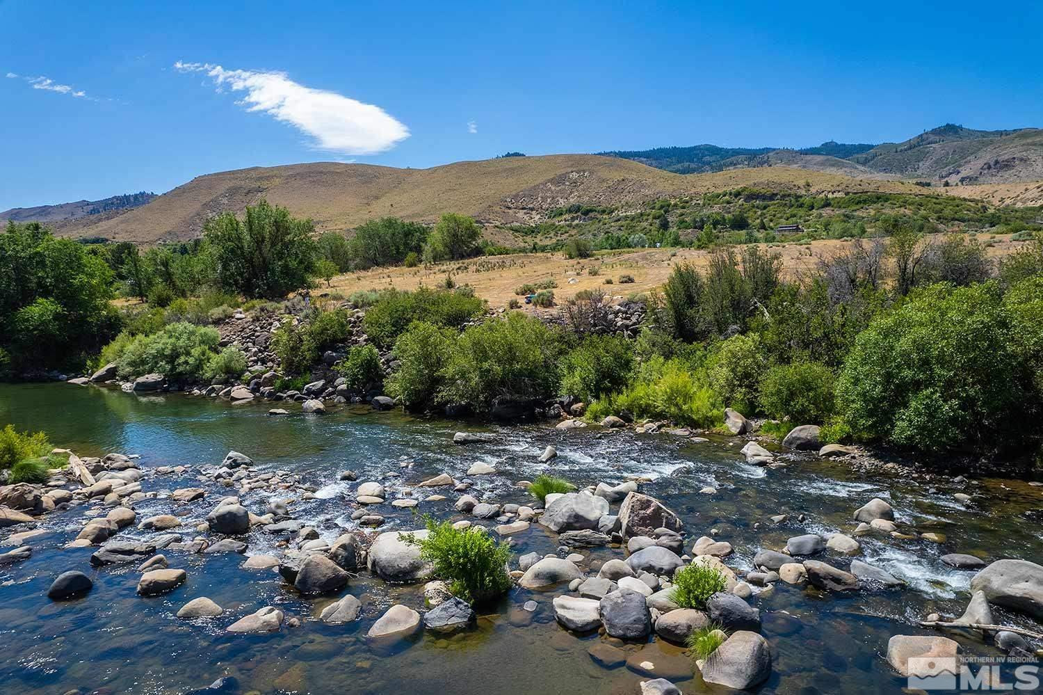 3205 Mario Road Verdi, NV 89523 - Photo 7 of 18 a view of a lake with a mountain in the background