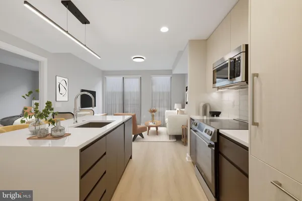 a view of a kitchen with furniture and a kitchen