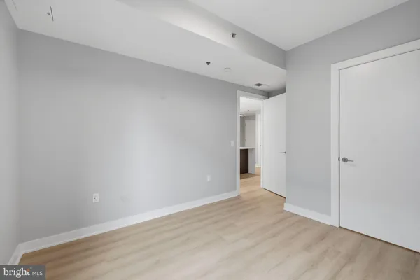 a view of storage and utility room with washer and dryer