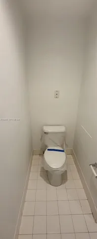 a bathroom with a toilet