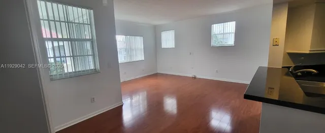 a view of livingroom with furniture and wooden floor