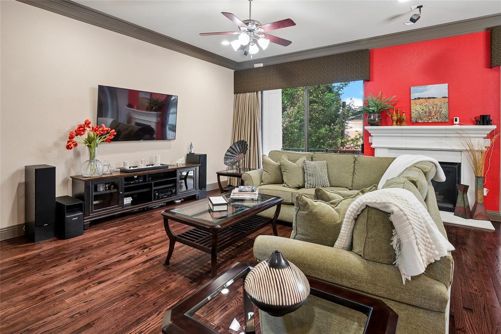 835 Rockingham Drive Irving, TX 75063 - Photo 7 of 27 a living room with furniture fireplace and flat screen tv
