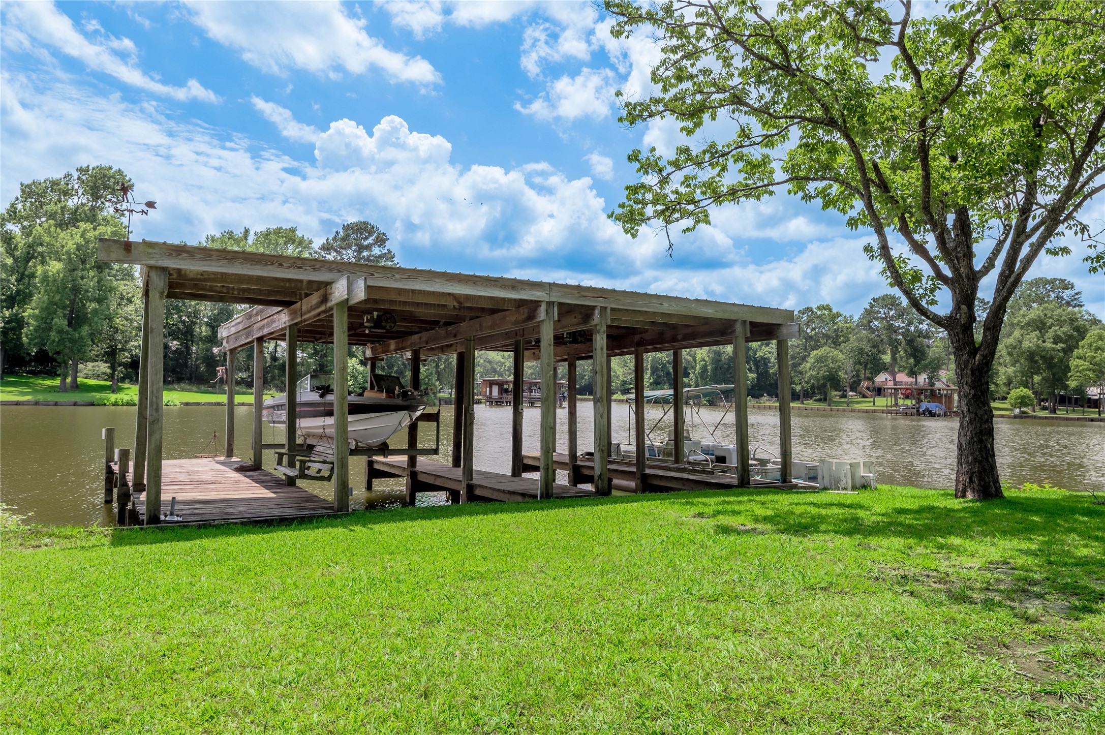 324 Red Oak Lane Trinity, TX 75862 - Photo 40 of 49 a view of a house with a yard and sitting area