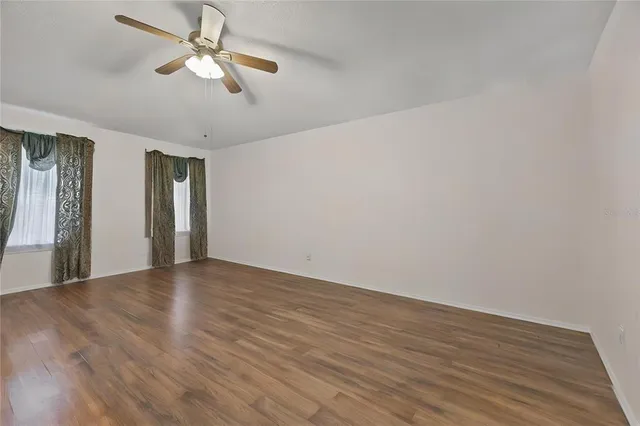 a bedroom with a bed and a desk