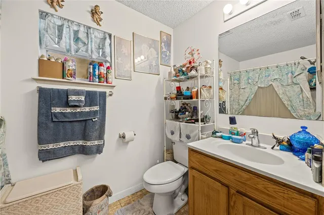 a view of a backyard with table and chairs