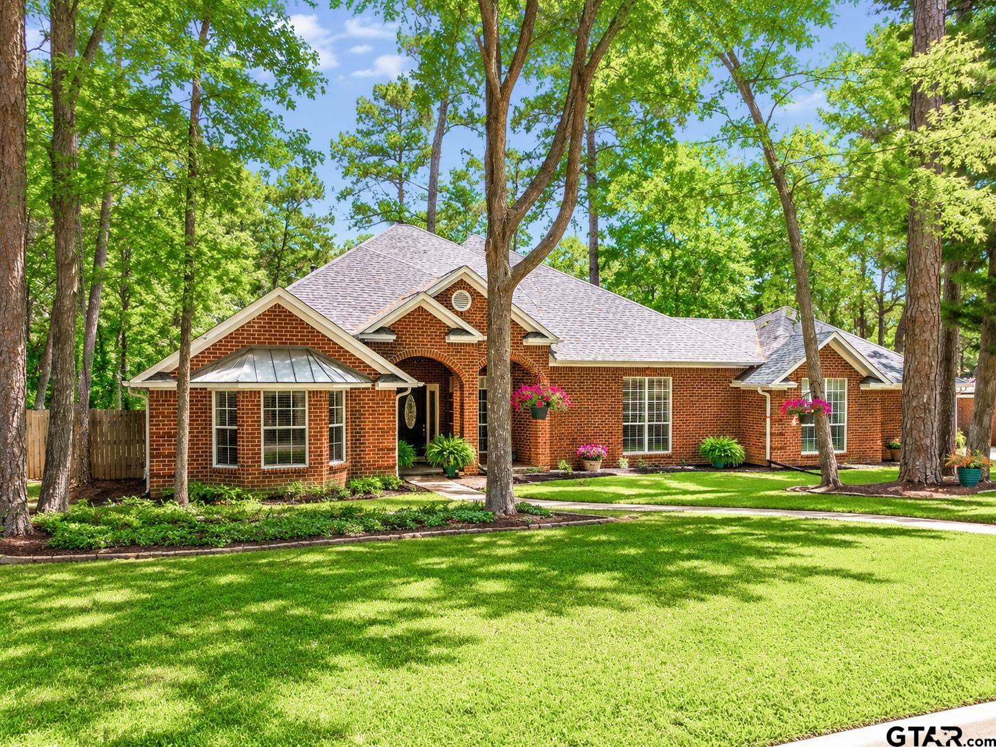 1388 Santa Fe Trail Tyler, TX 75703 - Photo 8 of 46 a front view of a house with a yard