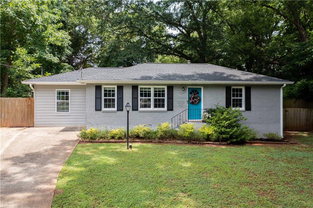 2176 Loring Court Decatur, GA 30032 - Photo 1 of 1 a front view of a house with garden