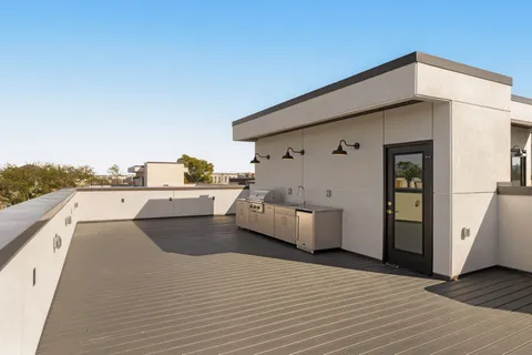 a view of a brick wall of building