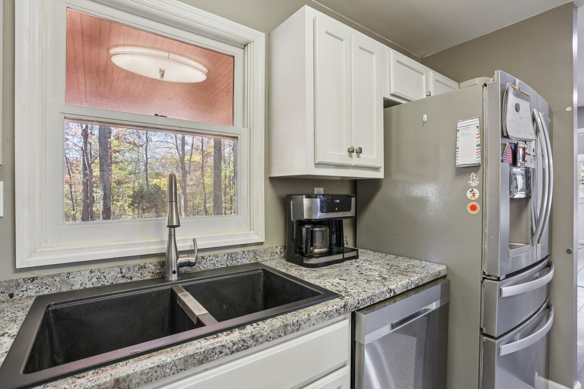 4515 C M Martin Road Springfield, TN 37172 - Photo 15 of 27 a kitchen with a refrigerator sink and cabinets