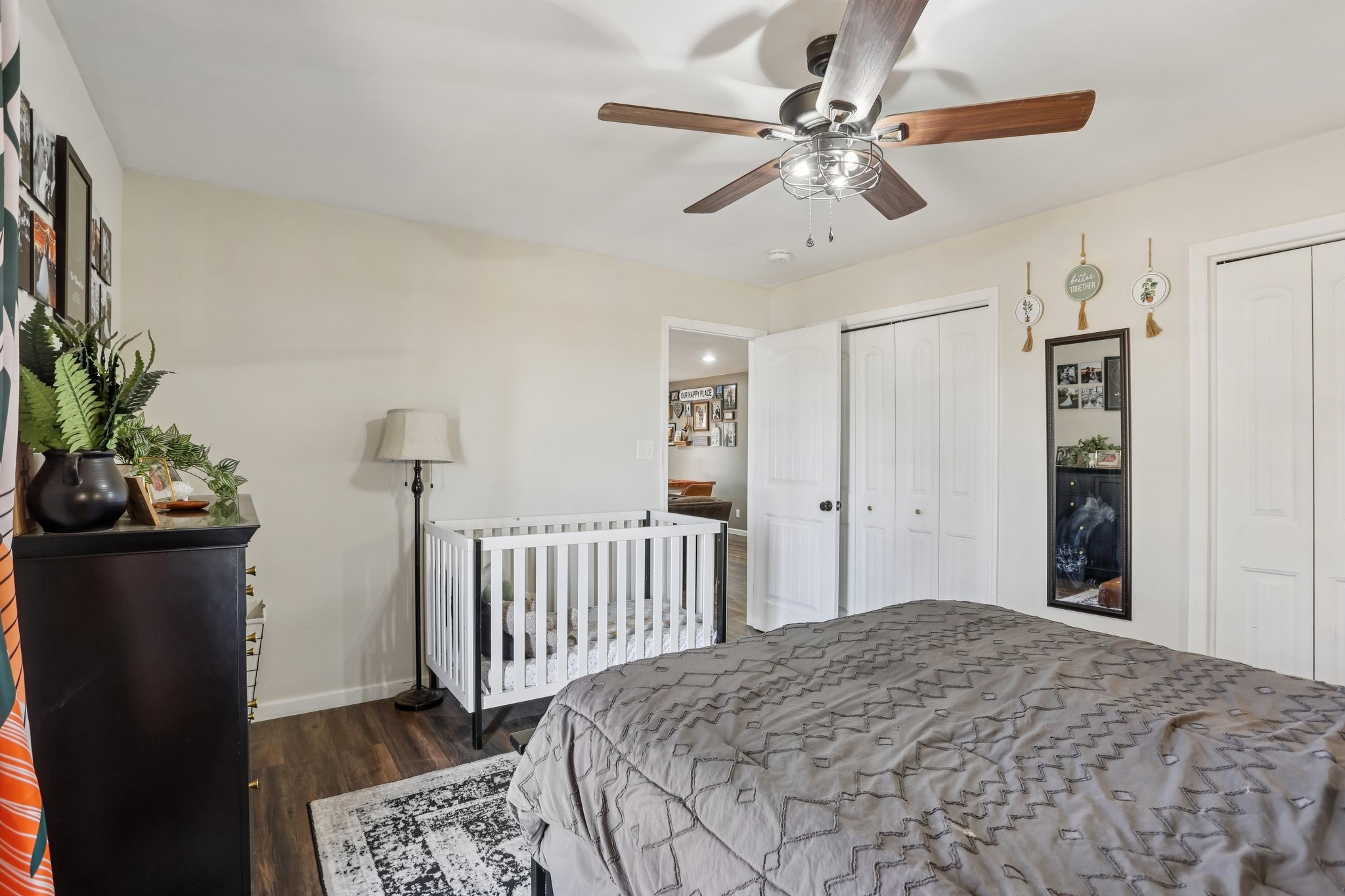 4515 C M Martin Road Springfield, TN 37172 - Photo 19 of 27 a bedroom with a bed and a chandelier