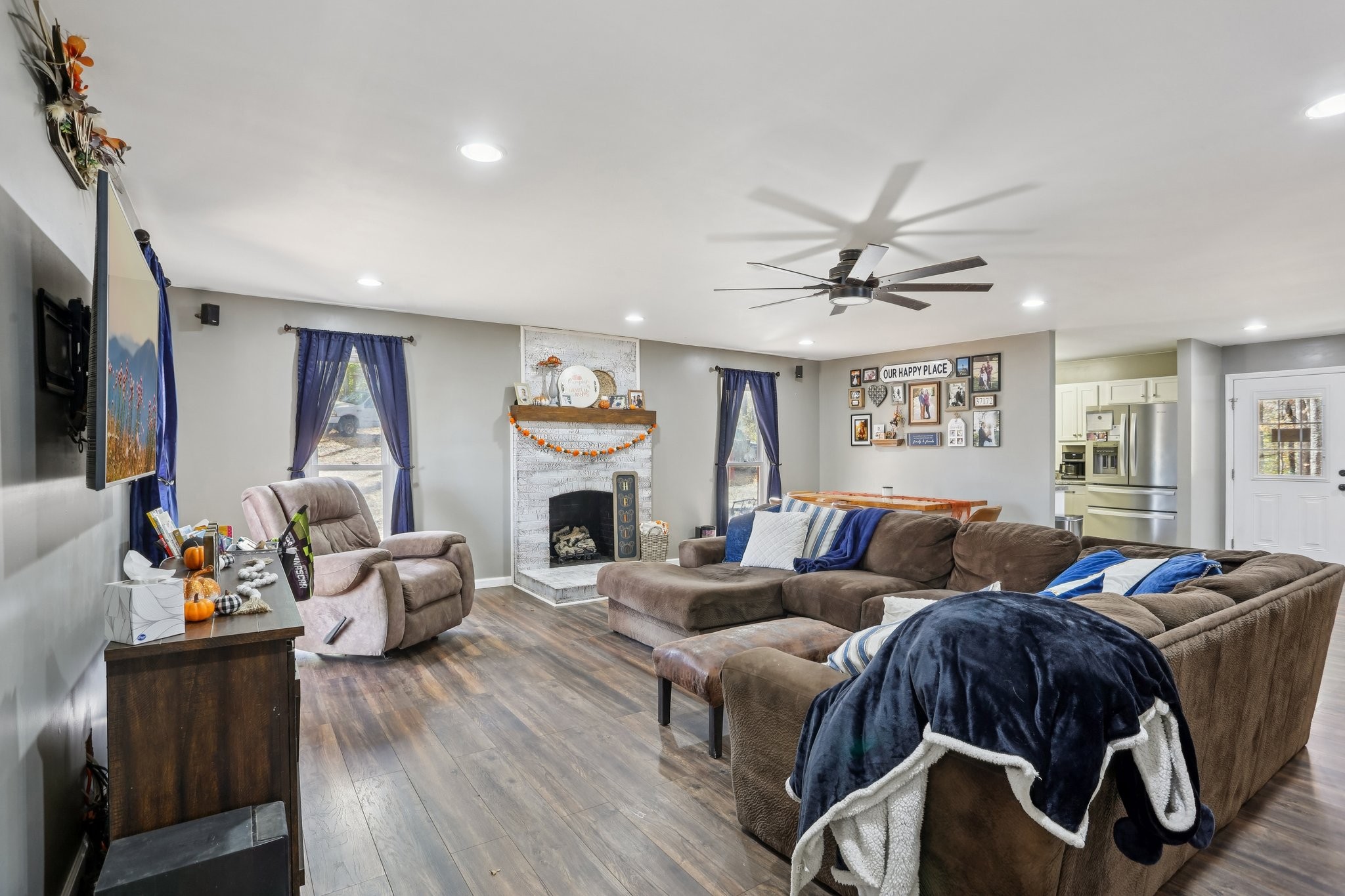 4515 C M Martin Road Springfield, TN 37172 - Photo 5 of 27 a living room with furniture a fireplace and a window