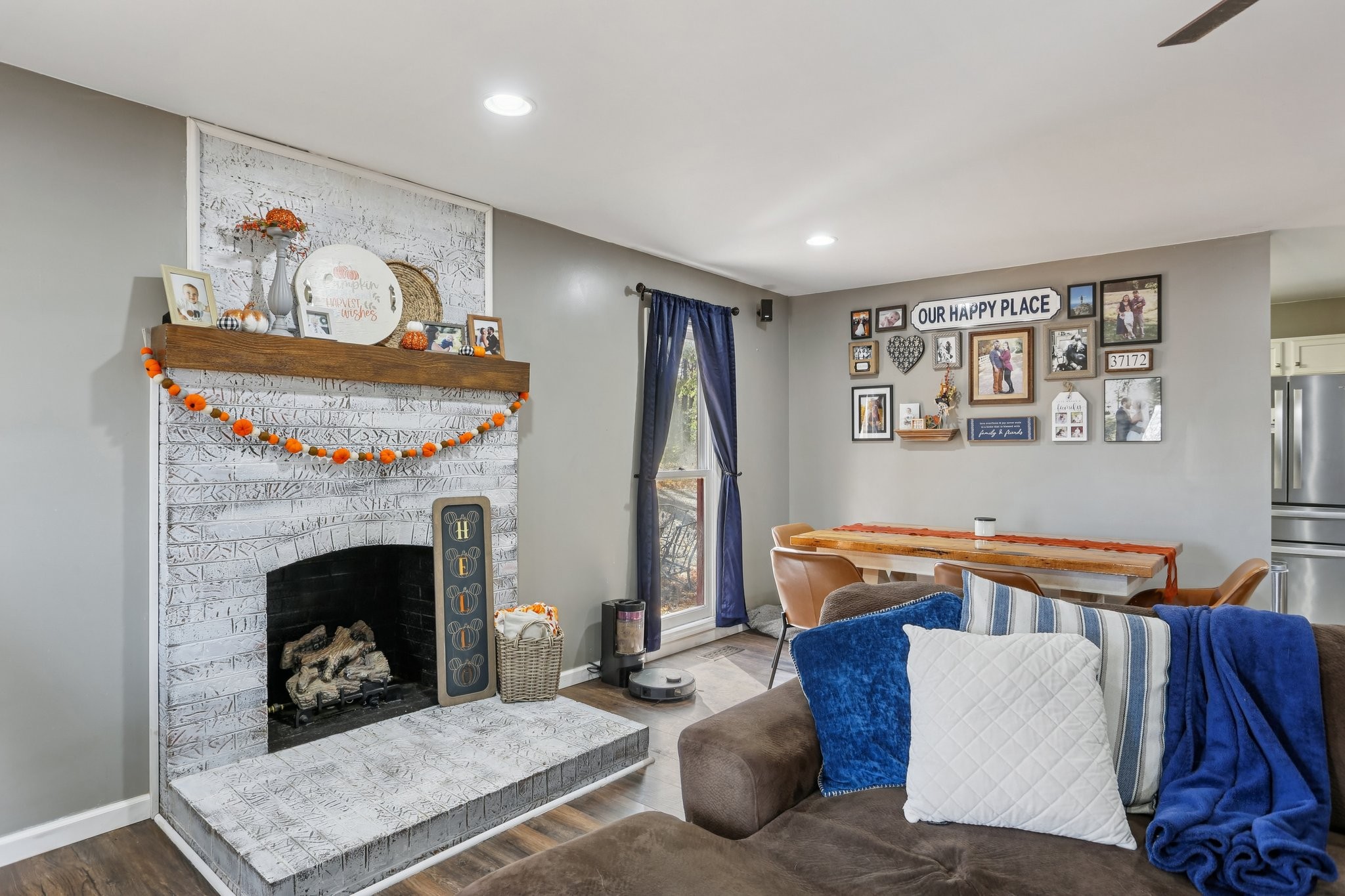 4515 C M Martin Road Springfield, TN 37172 - Photo 7 of 27 a living room with furniture and a fireplace