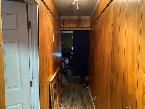 a bed room with a bed and a mirror