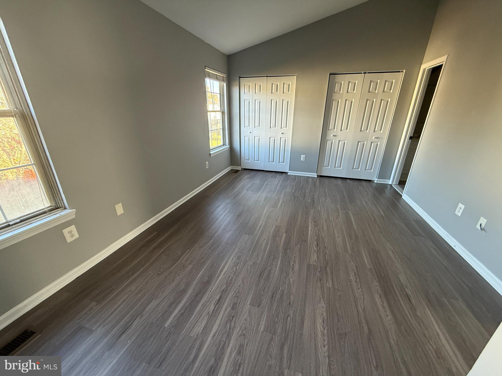 1027 Pirates Court Edgewood, MD 21040 - Photo 11 of 21 a view of an empty room with wooden floor and a window
