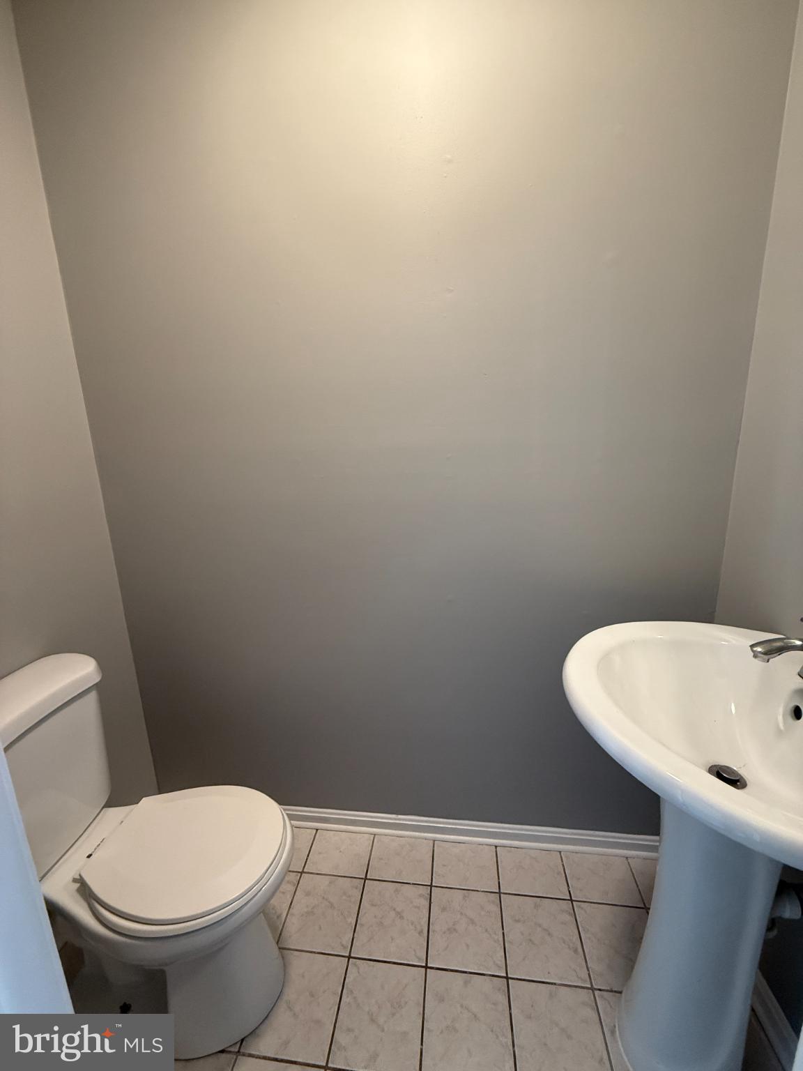 1027 Pirates Court Edgewood, MD 21040 - Photo 14 of 21 a bathroom with a toilet and a sink