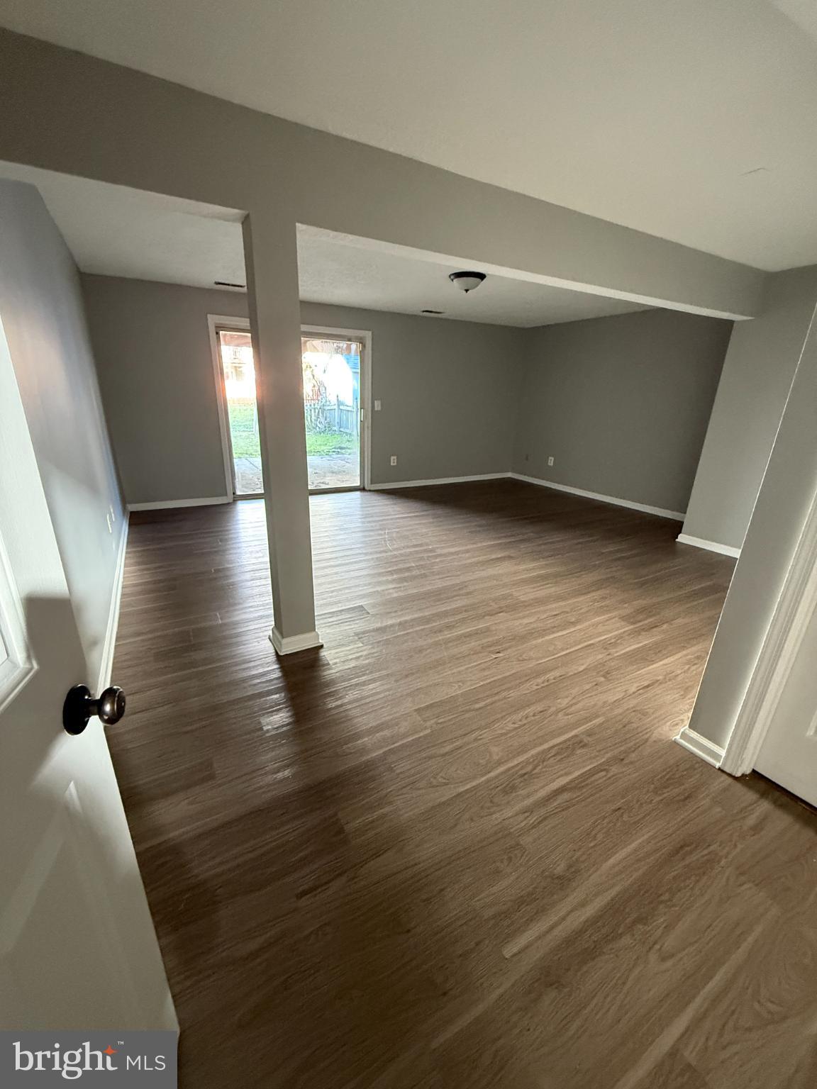 1027 Pirates Court Edgewood, MD 21040 - Photo 17 of 21 a view of room with window and wooden floor
