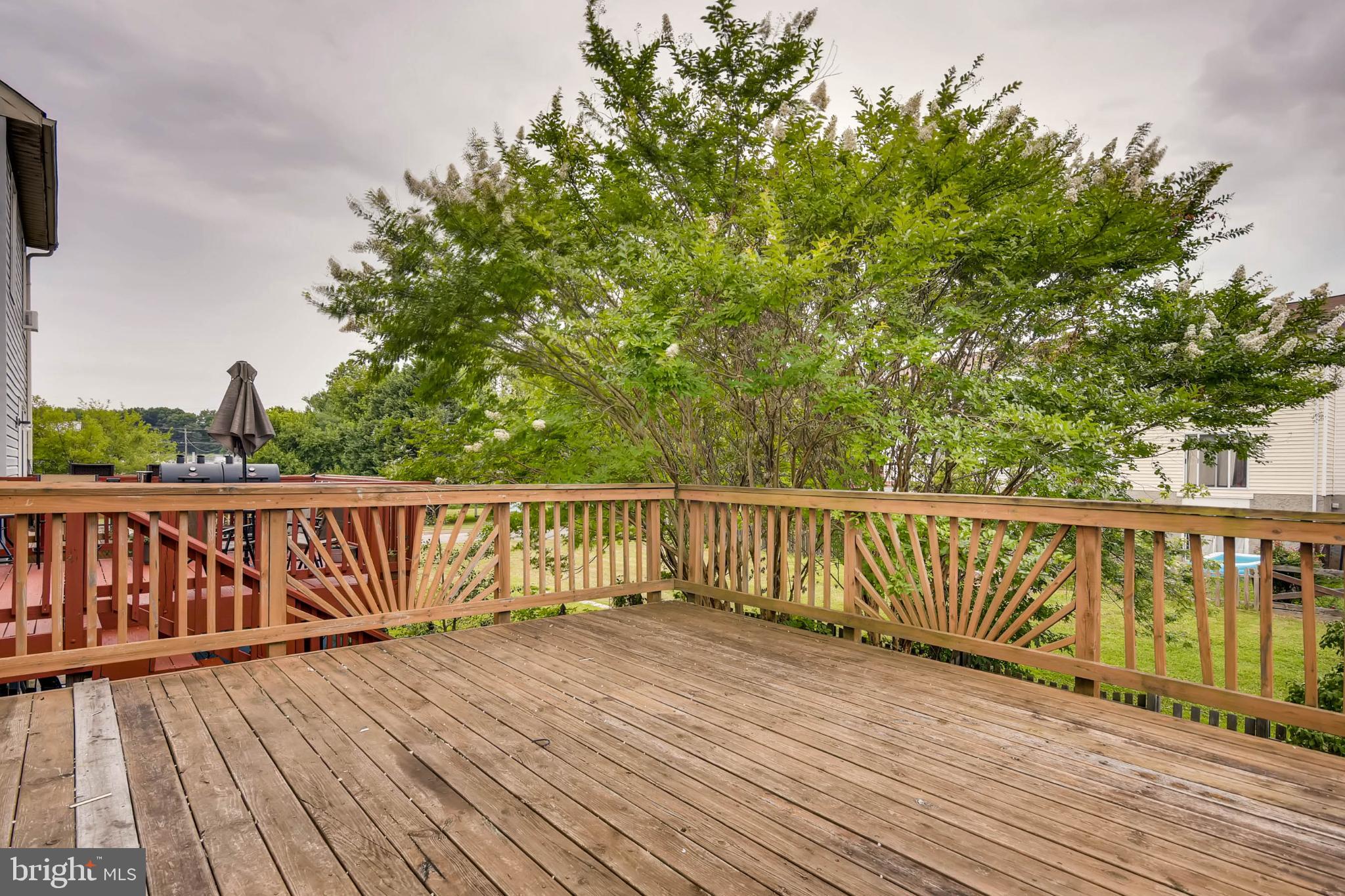 1027 Pirates Court Edgewood, MD 21040 - Photo 21 of 21 a view of balcony with wooden floor and fence