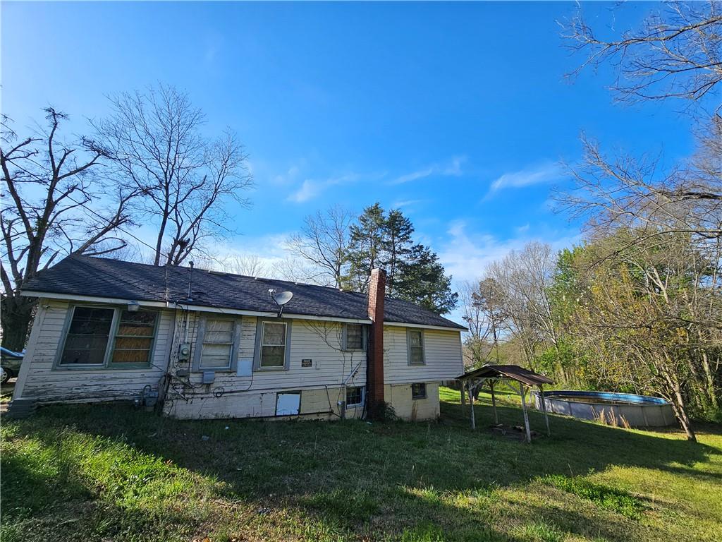 129 Brady Street Toccoa, GA 30577 - Photo 15 of 16 a view of a yard in front of a house