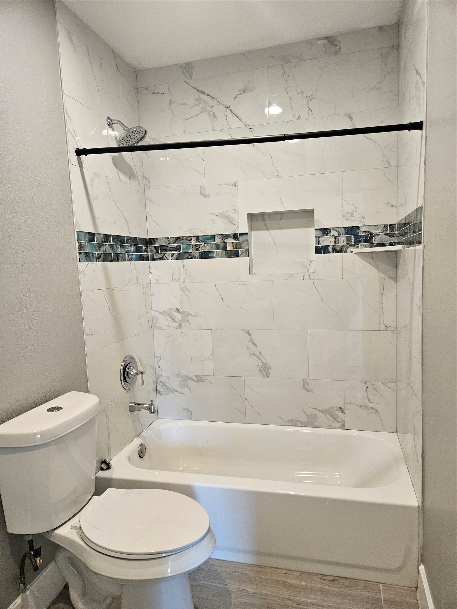 2017 3rd Street Galena Park, TX 77547 - Photo 12 of 23 a bathroom with a toilet and a bathtub