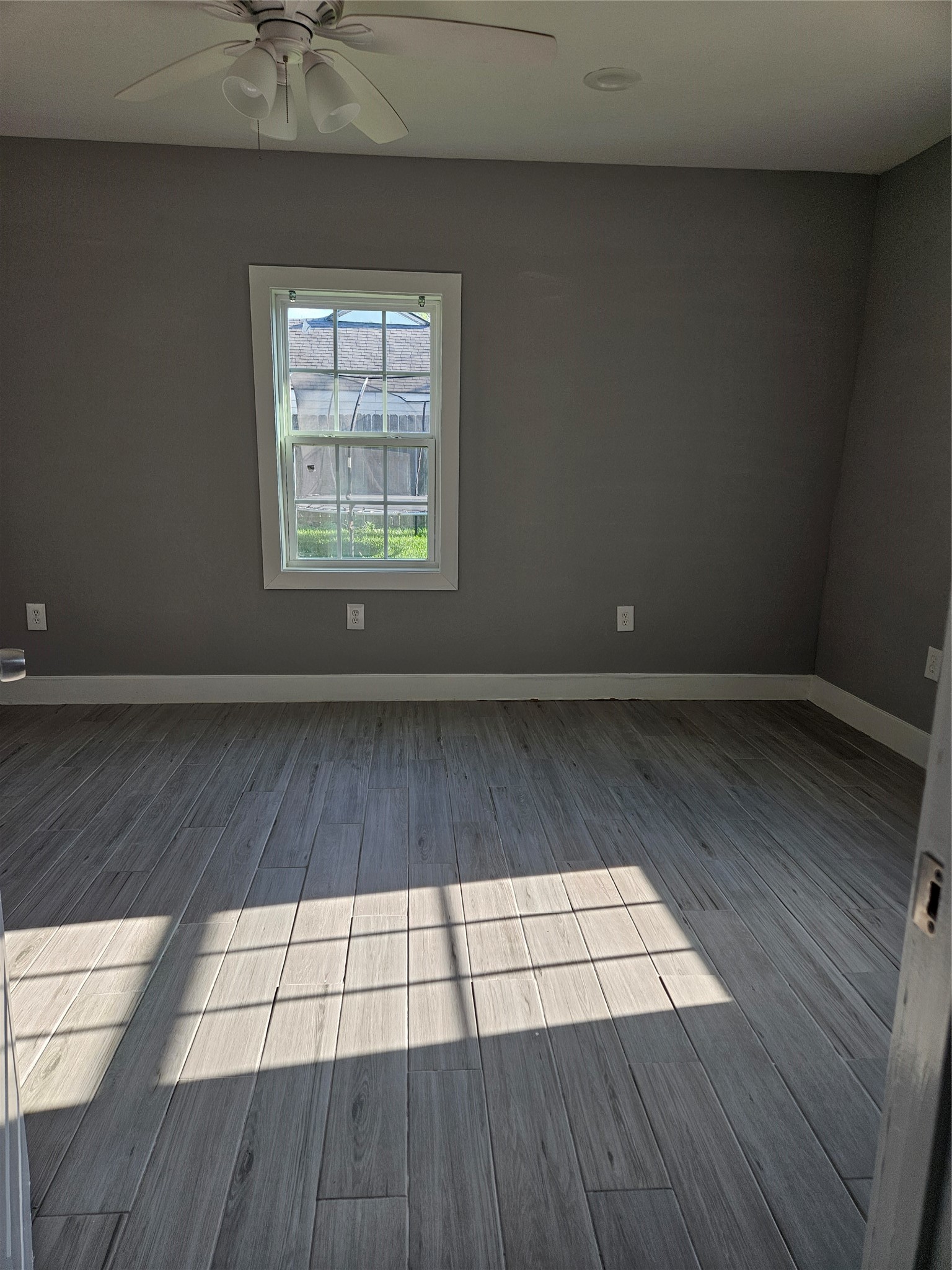 2017 3rd Street Galena Park, TX 77547 - Photo 10 of 23 a view of empty room with wooden floor and fan