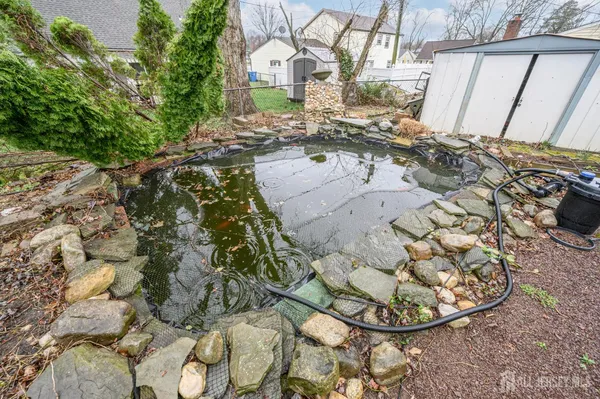 a view of a backyard of a house