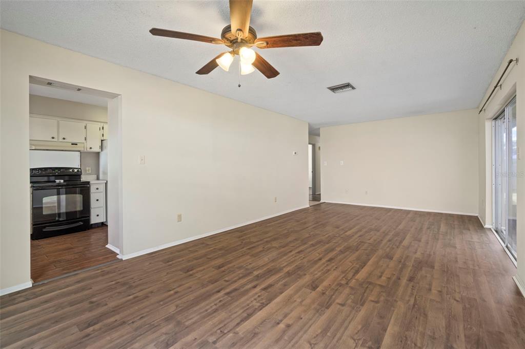 810 Black Knight Drive Valrico, FL 33594 - Photo 21 of 44 a view of empty room with wooden floor