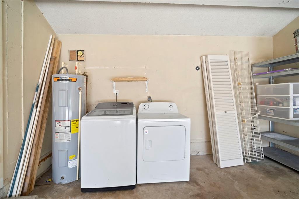 810 Black Knight Drive Valrico, FL 33594 - Photo 44 of 44 a utility room with dryer and washer