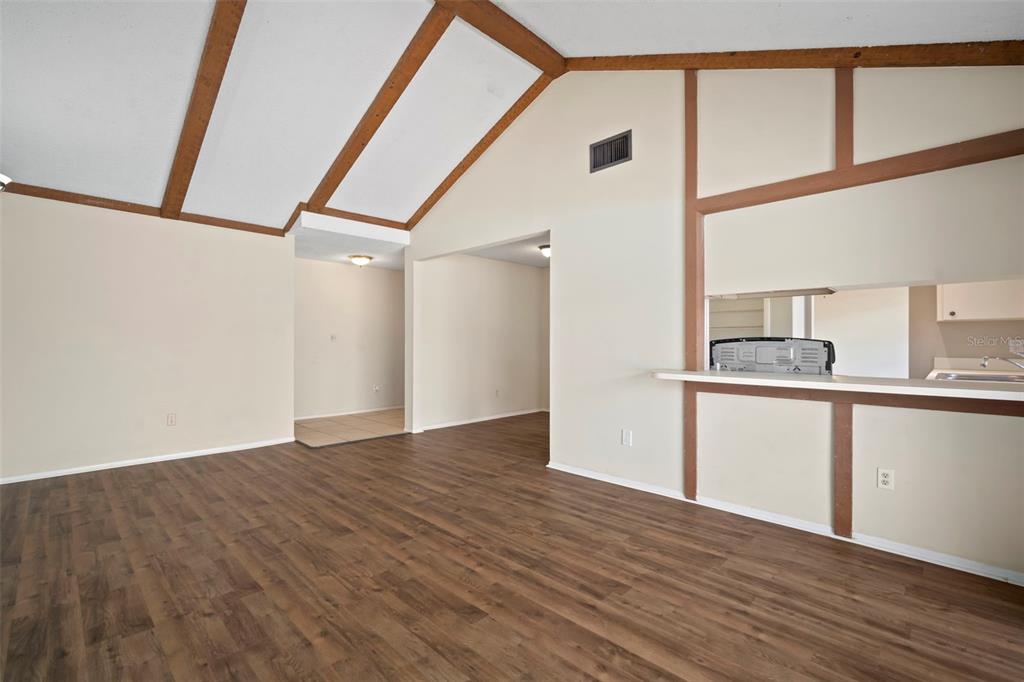 810 Black Knight Drive Valrico, FL 33594 - Photo 10 of 44 a view of a kitchen with wooden floor