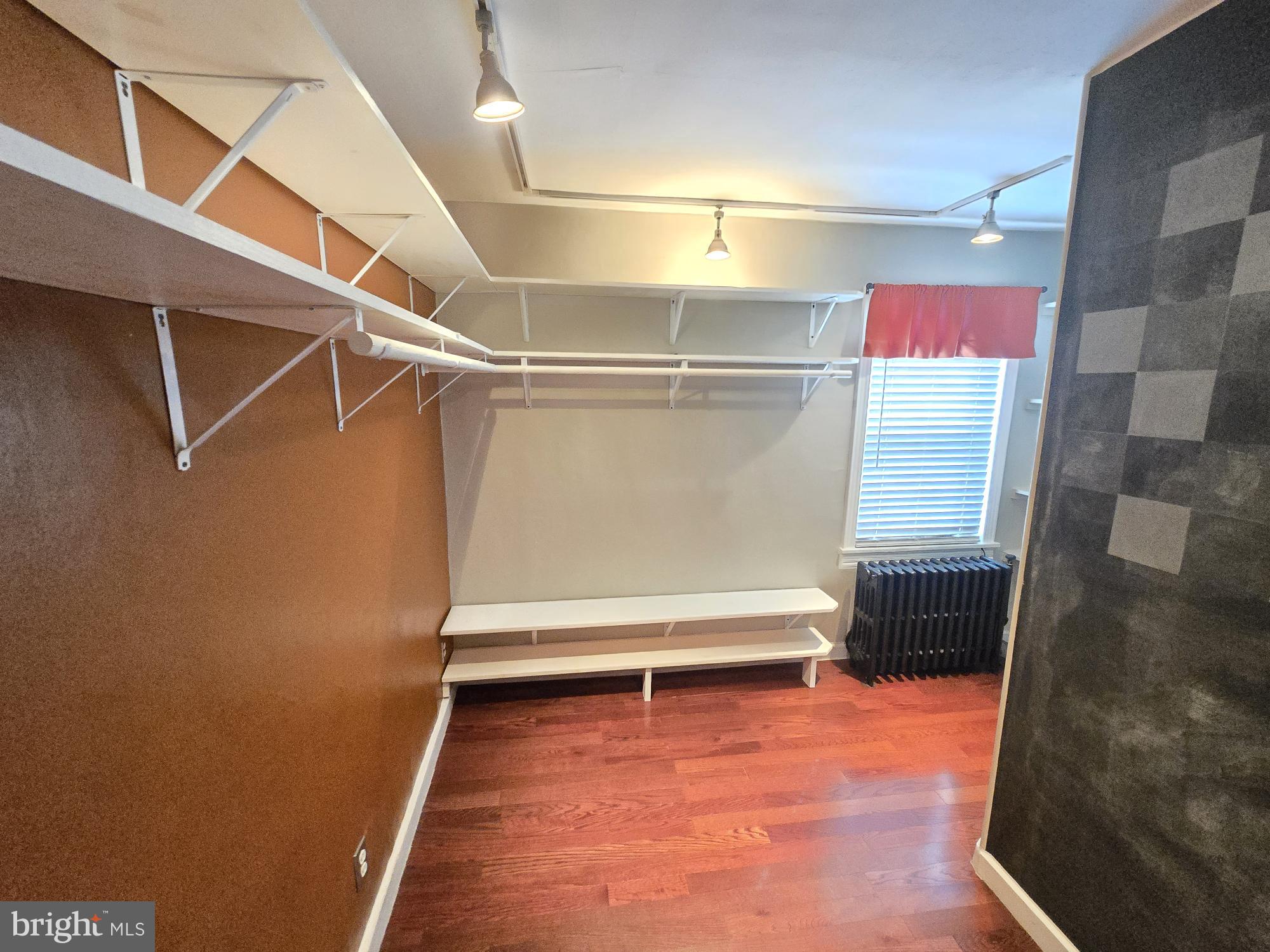 2 North Luzerne Avenue Baltimore, MD 21224 - Photo 20 of 31 a view of an empty room with wooden floor
