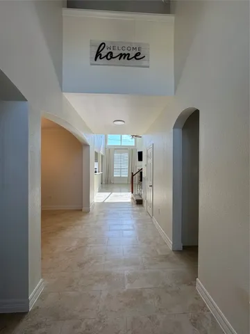 a view of a hallway with closet