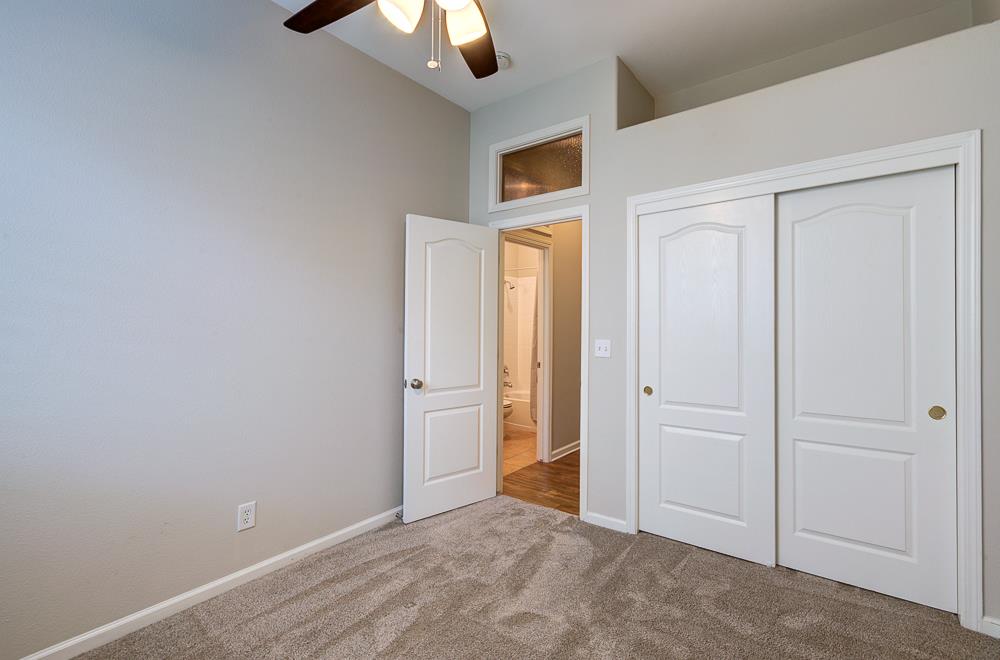 3235 Rall Avenue Clovis, CA 93619 - Photo 24 of 33 an empty room with a empty space and windows