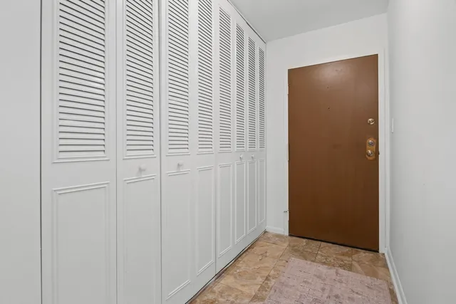 an entryway with a small space