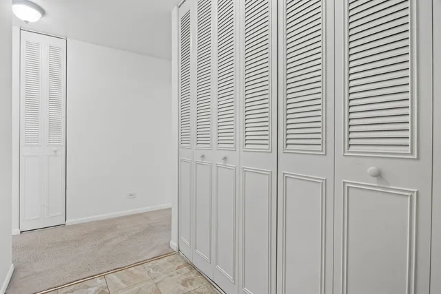 a view of a livingroom with an entryway